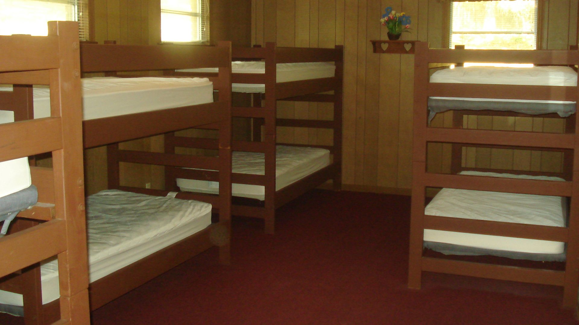 A close up picture of the bunk beds in Camp Kinard's Cottages.