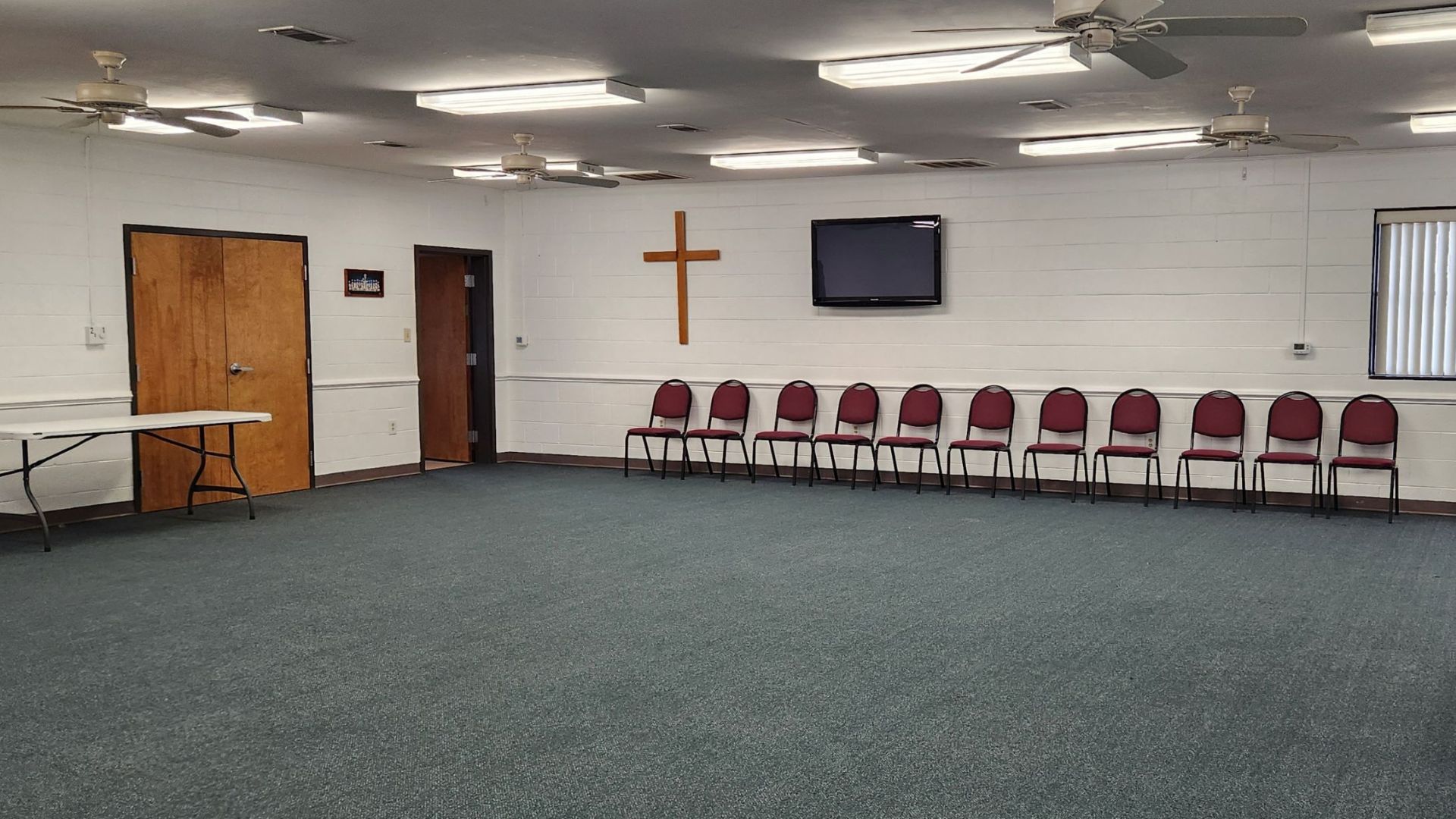 A wide shot of the Caughman Center at Camp Kinard without any tables or chairs.